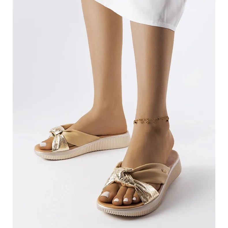 Beige and gold wedge sandals from Luce