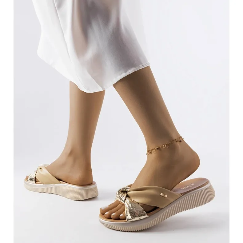 Beige and gold wedge sandals from Luce