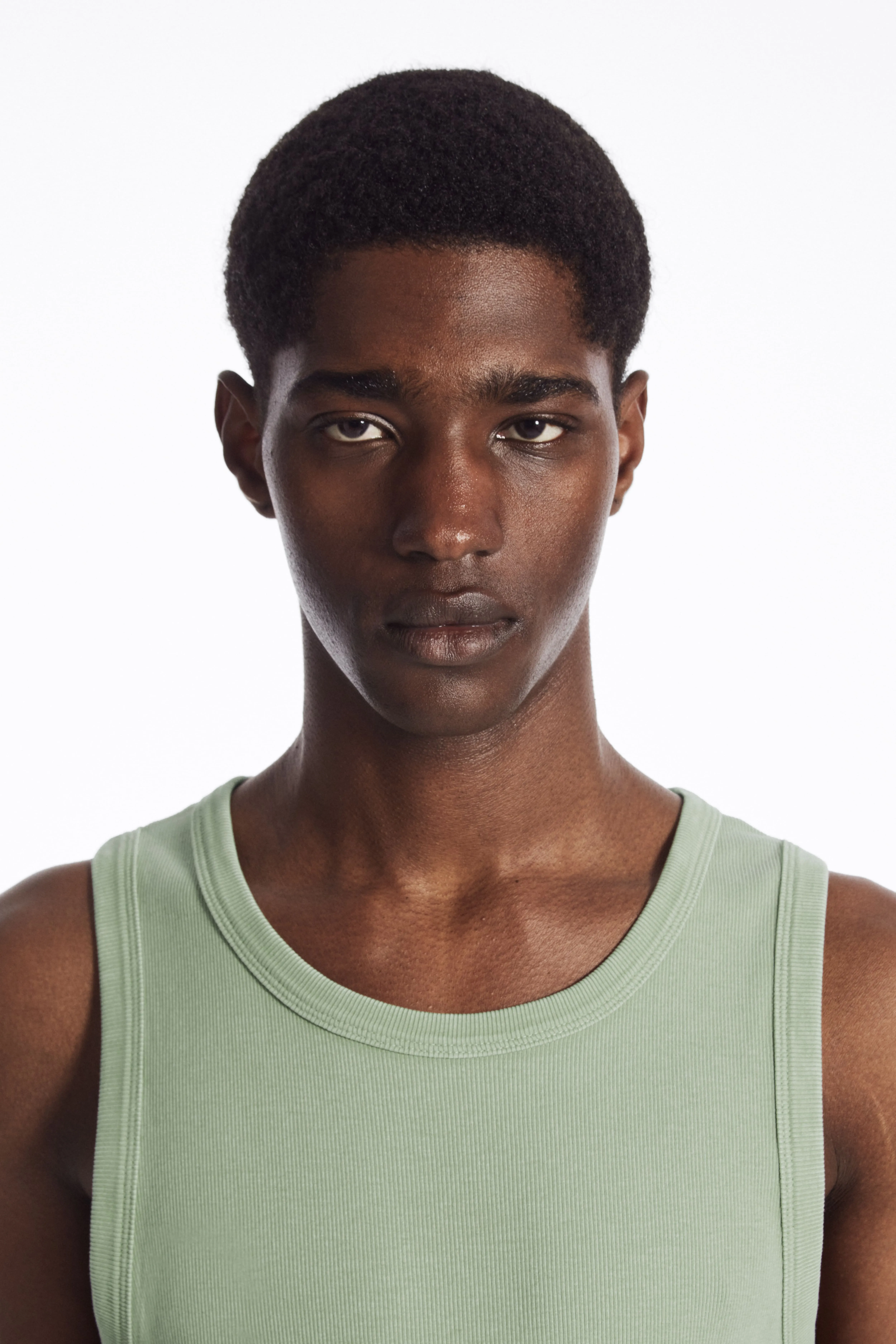 SLIM-FIT ACID-WASH TANK TOP - Round neck - Sleeveless - DUSTY LIGHT GREEN - Men | H&M GB